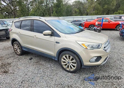 2017 Ford Escape Titanium z USA, uszkodzony, nr VIN 1FMCU0JD0HUC23545